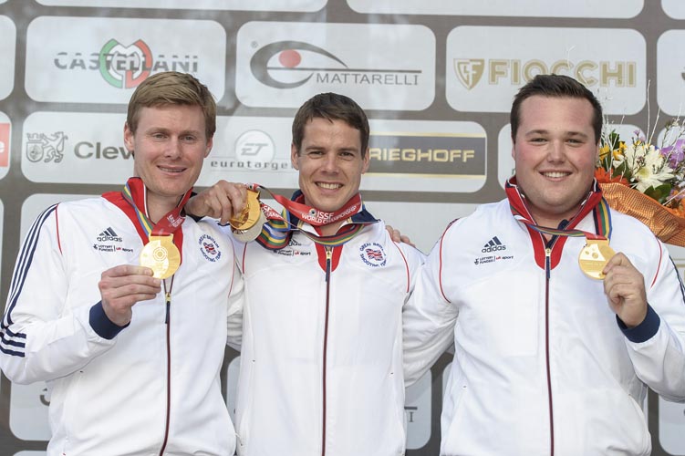 LONATO - SEPTEMBER 14: Gold medalist Team of Great Britain (Tim KNEALE, Matthew John COWARD-HOLLEY, Matthew FRENCH) pose with their medals after Double Trap Men Event at the Olympic Shooting Range "Trap Concaverde" during Day 4 of the ISSF World Championship Shotgun on September 14, 2015 in Lonato, Italy. (Photo by Nicolo Zangirolami)