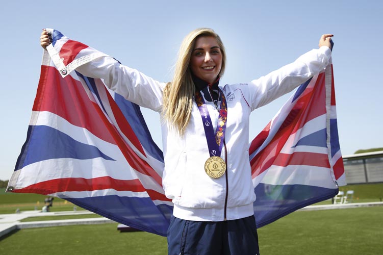 BAKU, AZERBAIJAN - JUNE 20:  Gold medalist Amber Hill of Great Britain celebrates  with the medal won in during the Women's Skeet shooting final during day eight of the Baku 2015 European Games at the Baku Shooting Centre on June 20, 2015 in Baku, Azerbaijan.  (Photo by Tom Pennington/Getty Images for BEGOC)